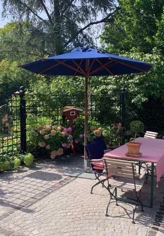 Bauhaus Metal Railing Panels by Classic Garden Elements near outdoor seating area