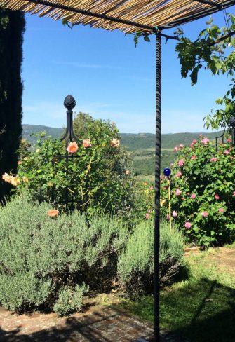 Garden Obelisk I by Classic Garden Elements in a garden in Tuscany