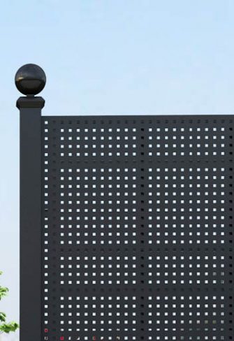 Close-up of the ball finial on the Gropius Iron Railing Privacy Screen by Classic Garden Elements