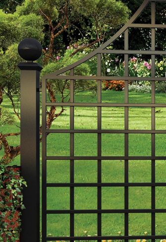 Close-up of the Rushton Hall Wrought-Iron Railing by Classic Garden Elements with ball finial