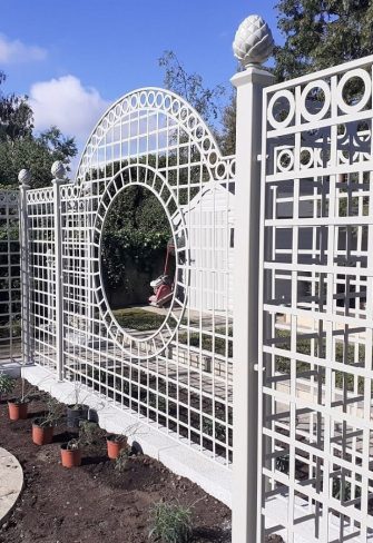 Side view of the exclusive Trianon Rose Treillage Set by Classic Garden Elements, powder coated in white