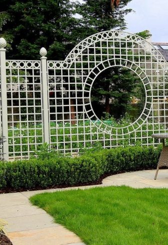 The metal Trianon Rose Treillage Set by Classic Garden Elements in white