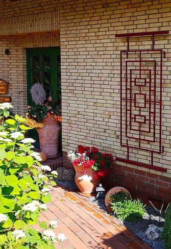 The Asian Wall Trellis Hong Kong by Classic Garden Elements in red