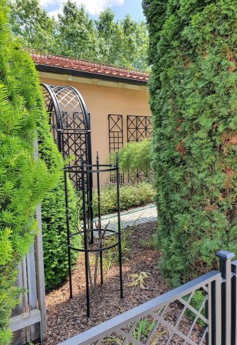 The Croome Espalier Trellis and other Classic Garden Elements garden structures in a garden in Tuscany