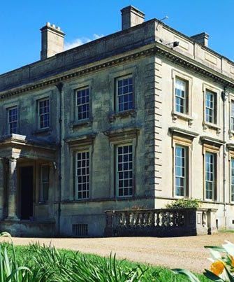 Exterior view of Lamport Hall in Northamptonshire, England