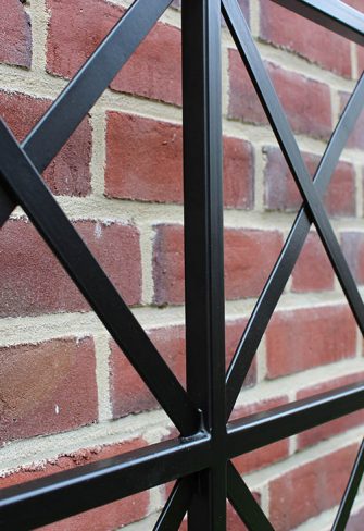 Close-up of the Ravenna Metal Wall Trellis by Classic Garden Elements