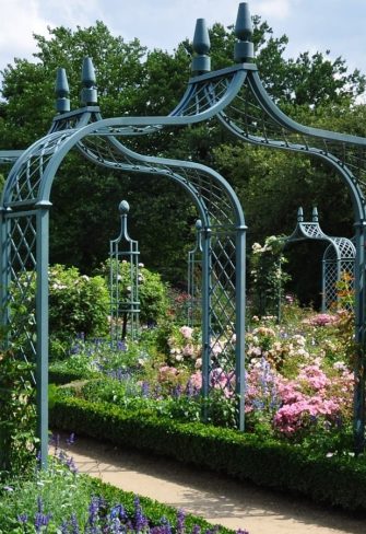 Numerous Brighton Victorian Rose Arches in pastel blue at the Arboretum Ellerhoop