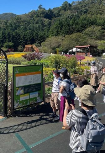 Mark Chapman greets visitors to the Peter Rabbit English Gardens at Fuji Motosuko Resort in Minamitsuru-gun in Japan under the Brighton Victorian rose arch with garden door