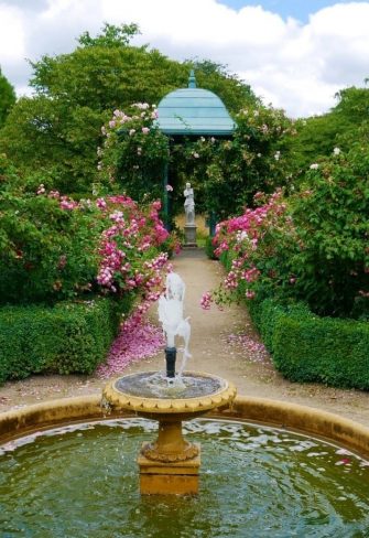 The Wallingford Gazebo with an antique statue creating an attractive focal point near a fountain