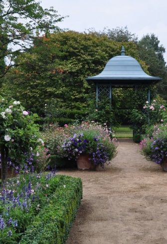 The Wallingford Gazebo and a garden obelisk surrounded by herbaceous borders at the Ellerhoop Arboretum