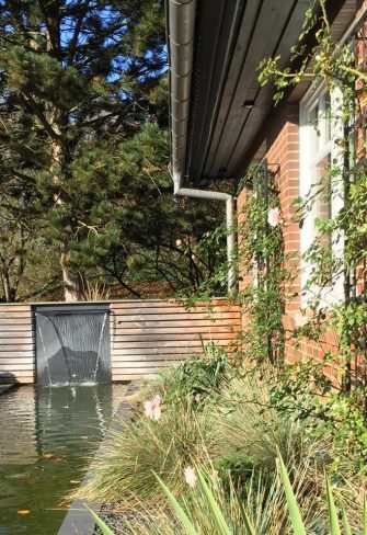 Small Modern Wall Trellises by Classic Garden Elements adorning a brick wall