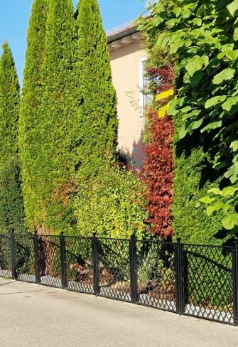 Long expanse of Portofino fence panels by Classic Garden Elements