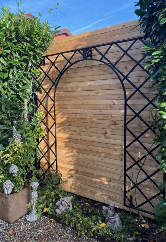 Metal trellis archway from Classic Garden Elements for climbing roses